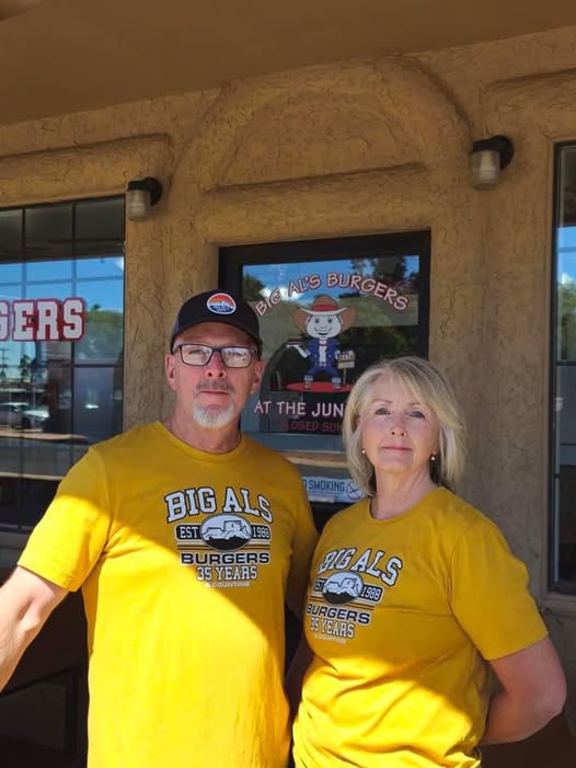 Couple with yellow shirt from Big Al's