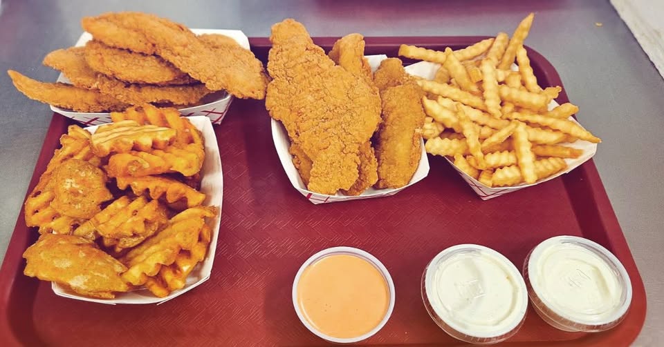 Fries and sides with dipping sauce